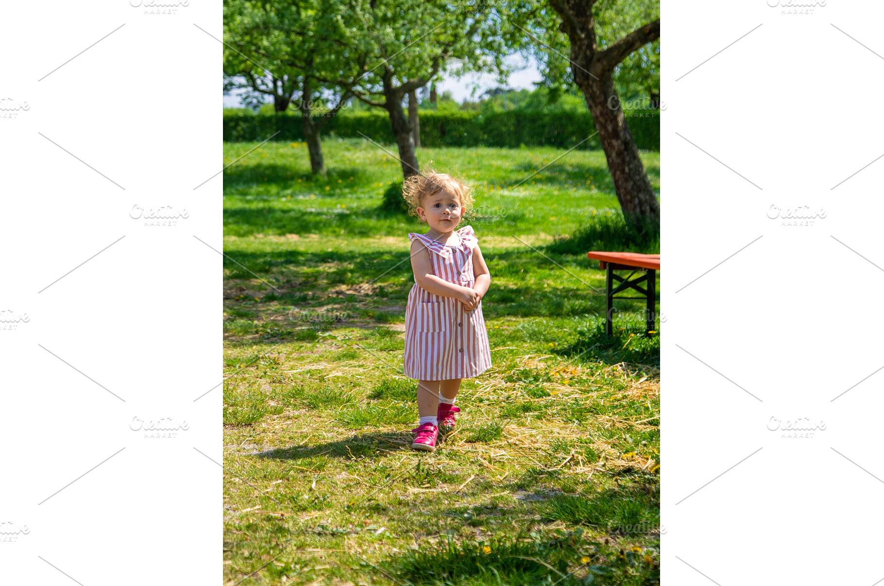 Child girl in the summer in the park, a Person Photo by yanadjana