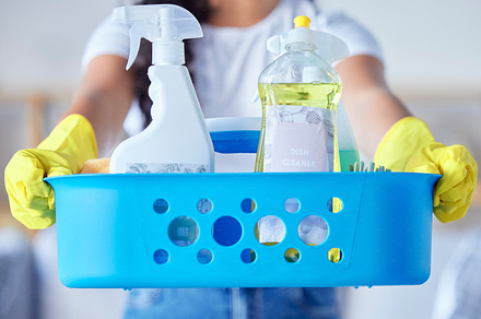 Hands, basket and cleaning tools for housekeeping, maintenance or disinfection in clean hygiene at home. Hand holding bucket of detergent supplies, equipment or chemical liquid for chores or services, a Photo by Peopleimages.com