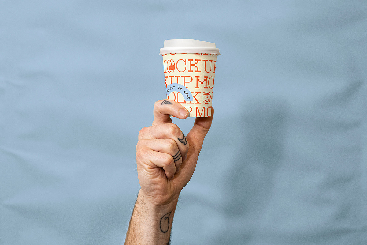 Everydays Coffee Cup in Hand Mockup, a Cups & Container Mockup by mockstar (Photo 1 of 2)