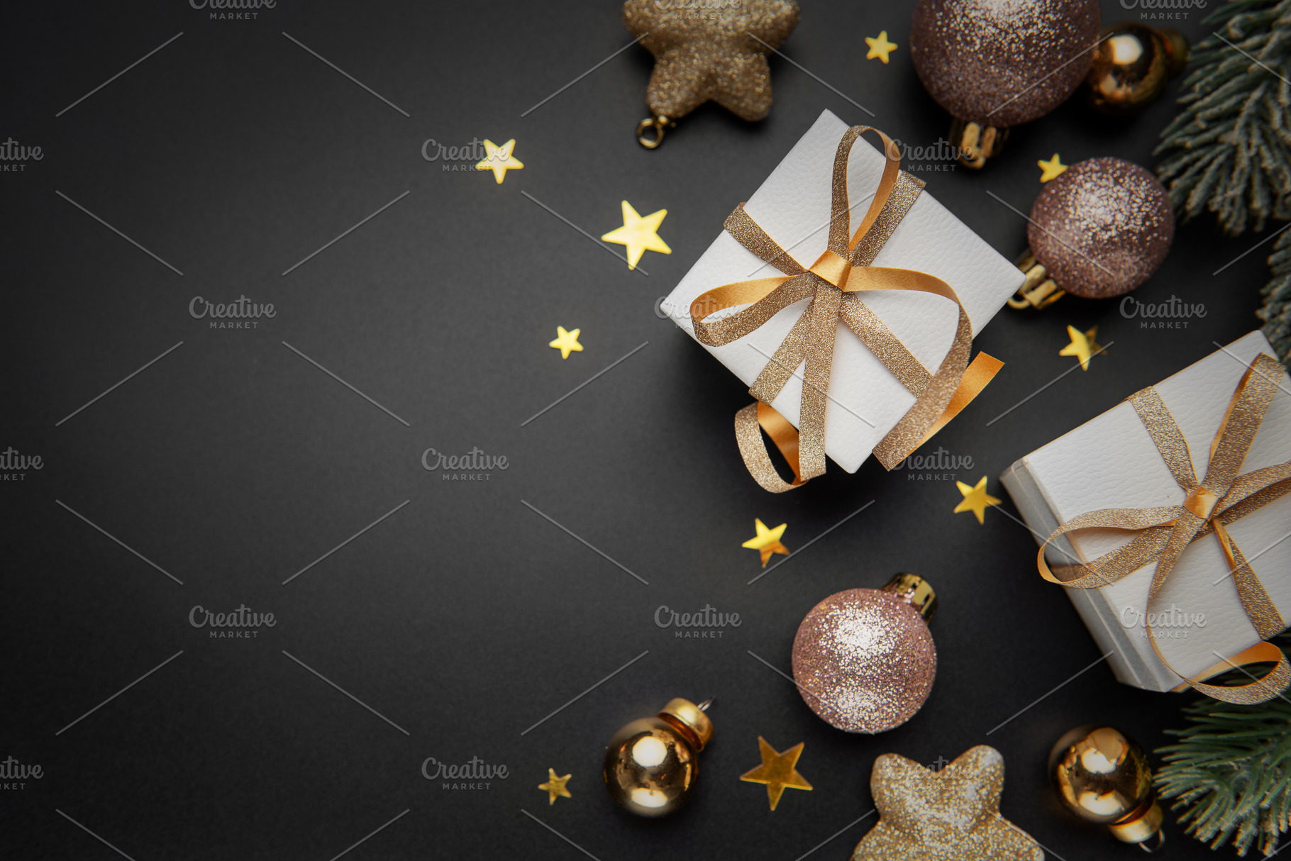 Christmas gifts and ornaments on black background, a Holiday Photo by Olena Rudo