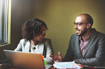 Colleagues working together indoor, a Photo by rawpixel