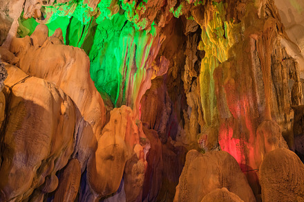 landscape of underground cave in Laos, with stalagmites and stal, a Nature Photo by Casanowe-studio
