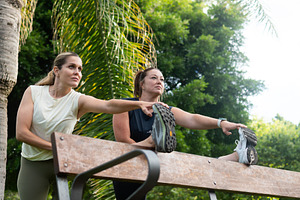 Women stretching legs after outdoor workout, a Sports & Recreation Photo by etorres69