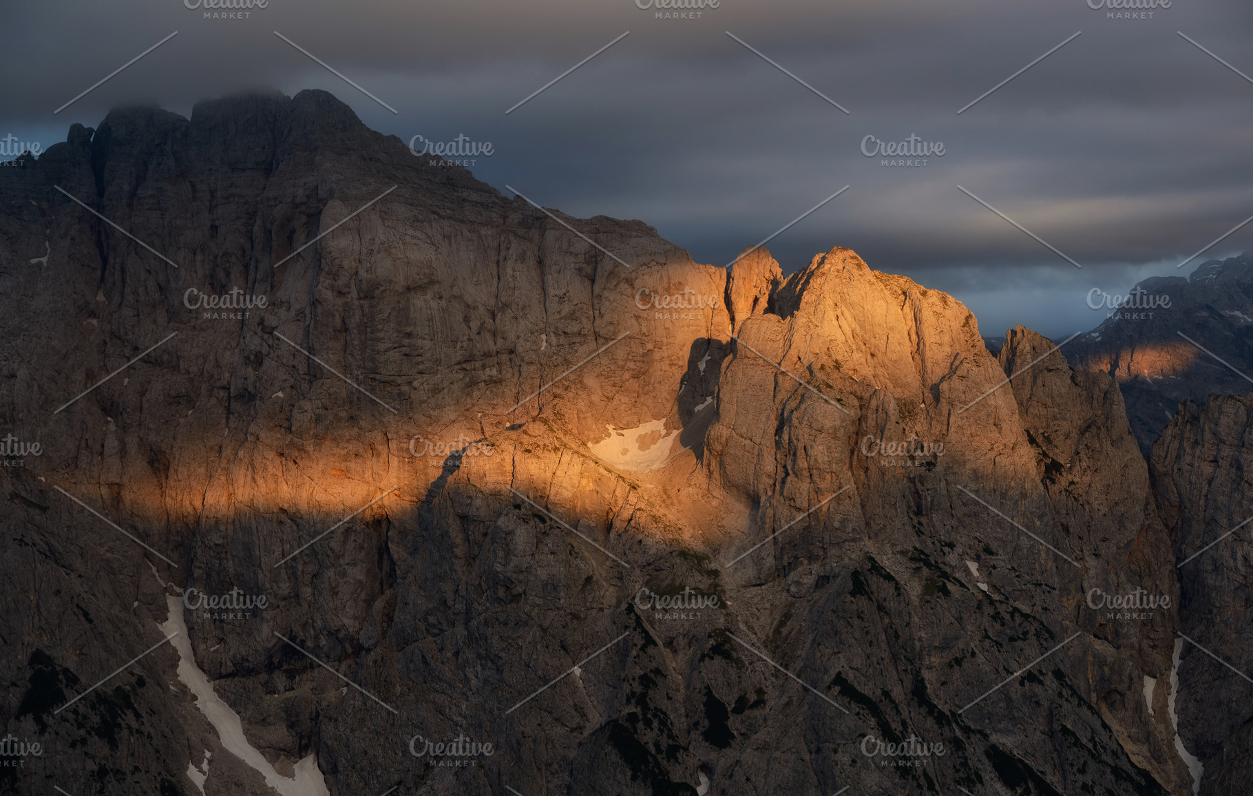 Sunset over the peaks of the mountai, a Nature Photo by Dreamy Pixel