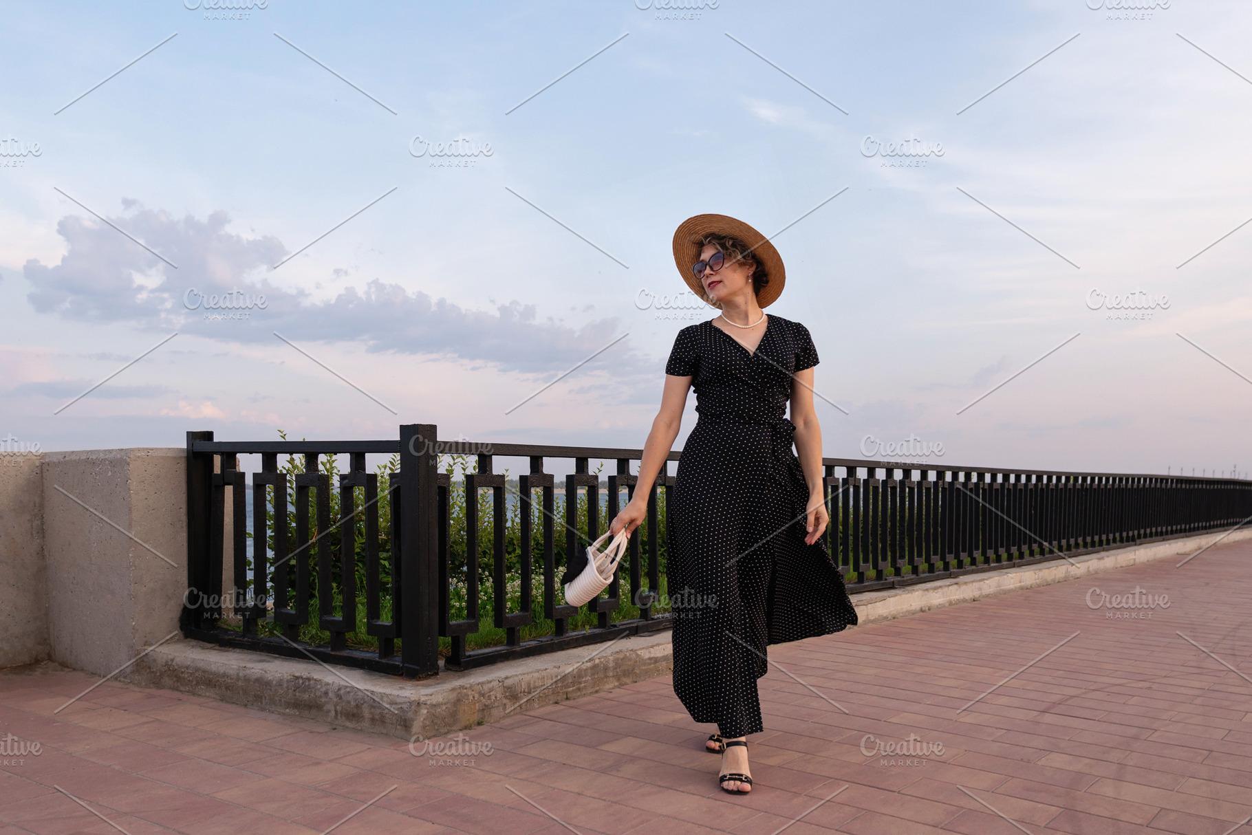 Stylish woman walks on promenade, a Person Photo by Elena Vagengeim
