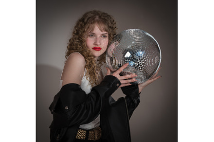 Confident young woman holding and, a Person Photo by Alexander-Piragis