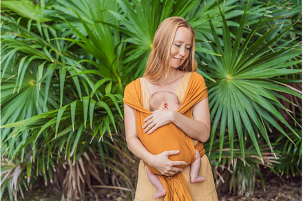 Mother holding her little baby in a