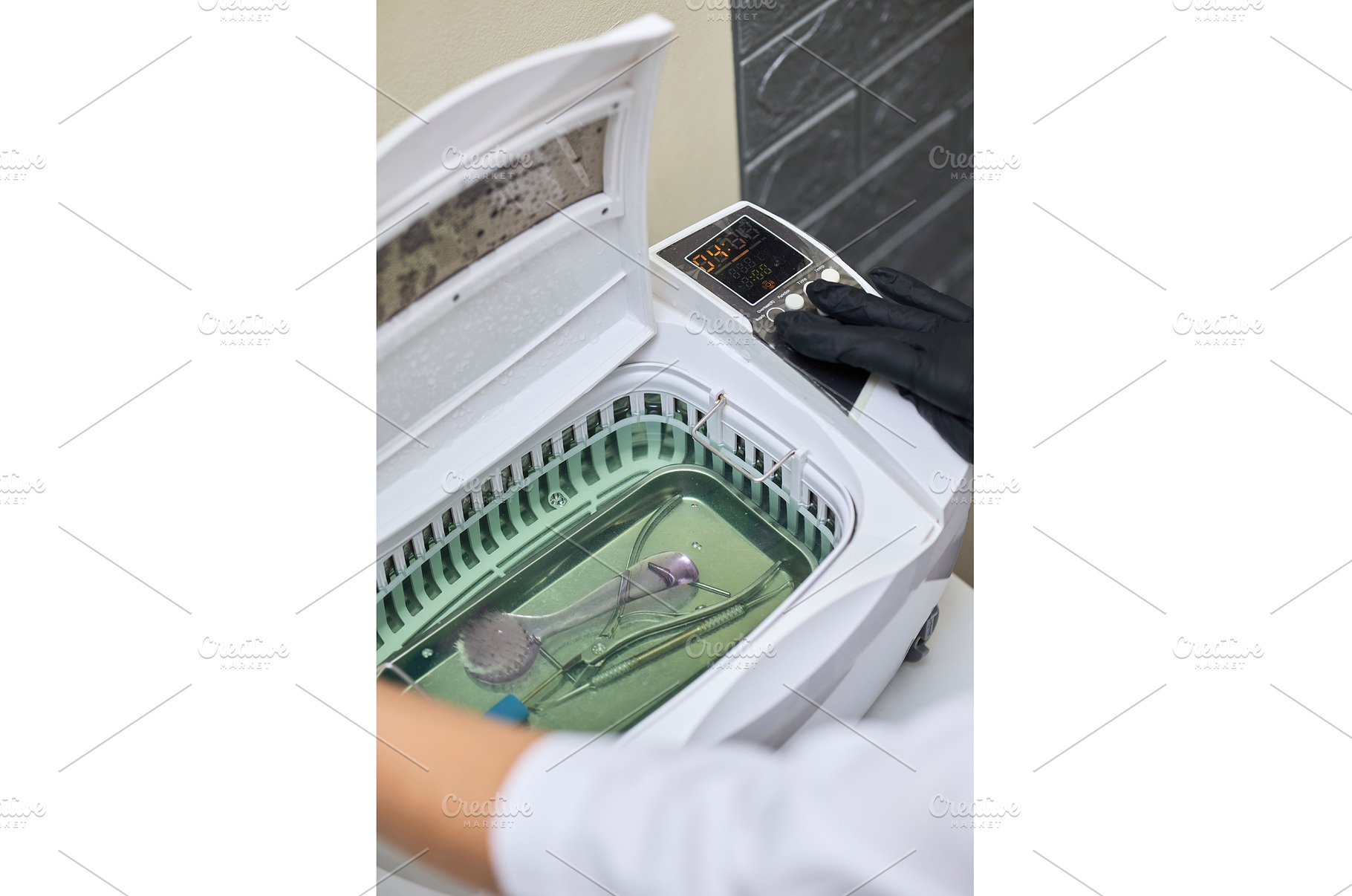 Disinfecting beauty salon tools in, a Health & Medical Photo by wip3out