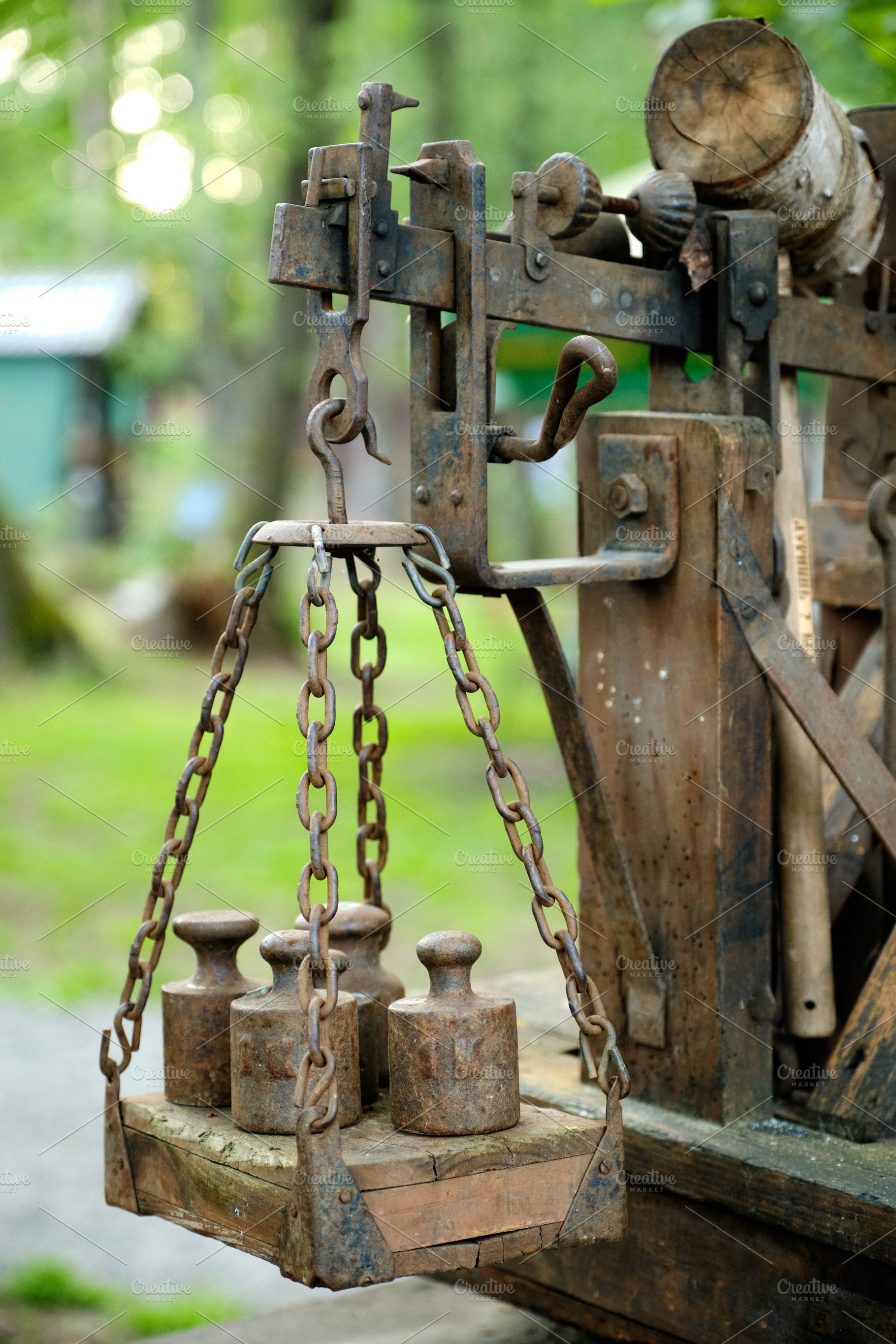 Close-up of an old, weathered weighing scale with its rusty chains and heavy me, an Industrial Photo by Rohan Photography