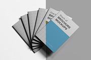 Stacked Brochure Mockup Kit 11 Views, a Books & Magazine Mockup by Illusiongraphic (Thumbnail 15 of 28)