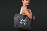 Woman Holding Tote Bag Mockup, a Merchandise Mockup by graphypix (Thumbnail 1 of 4)