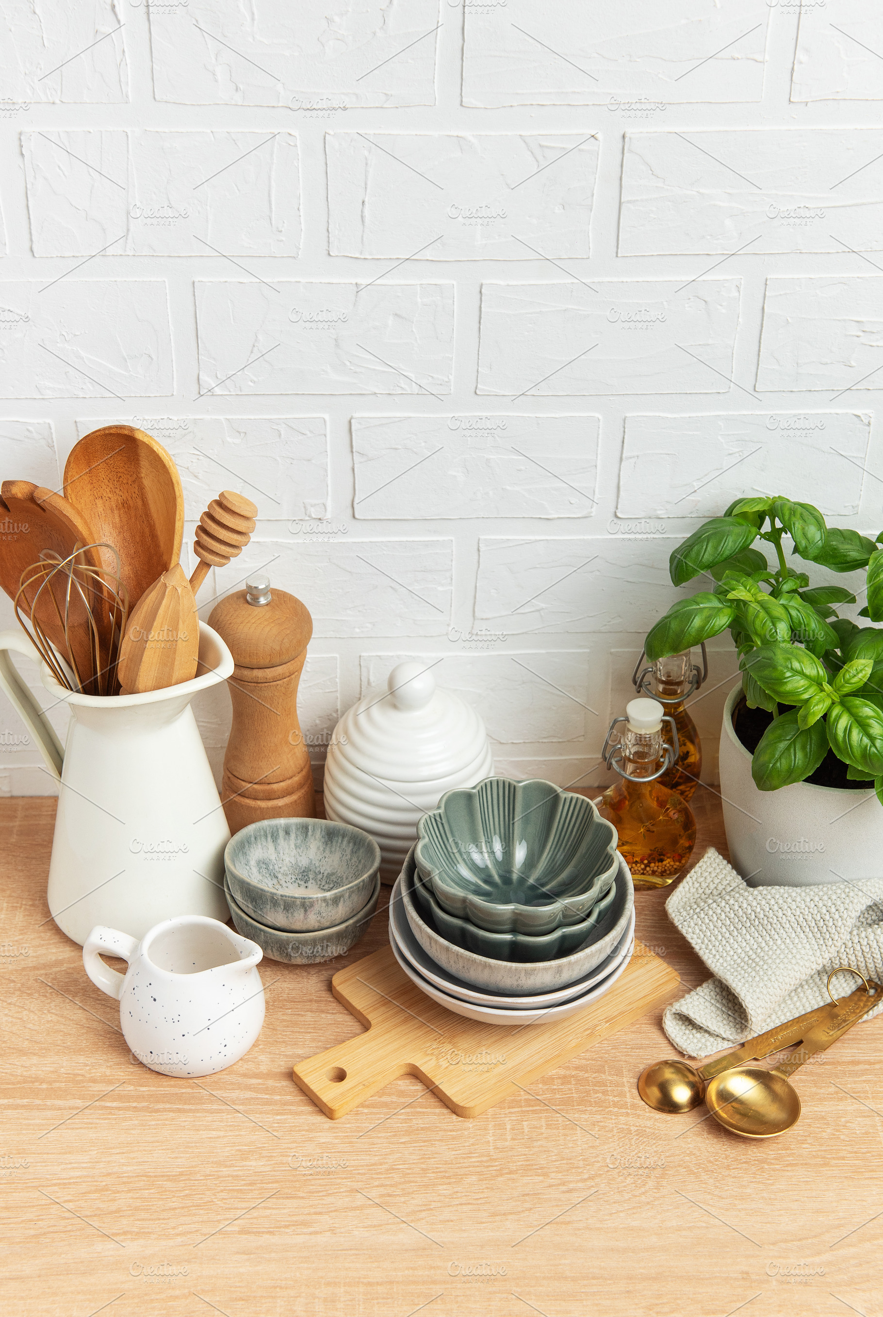 Kitchen utensils, bowls, and spices creating a cozy culinary sce, a Food & Drink Photo by Olena Rudo