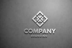 Silver Logo Mockup on Concrete Wall