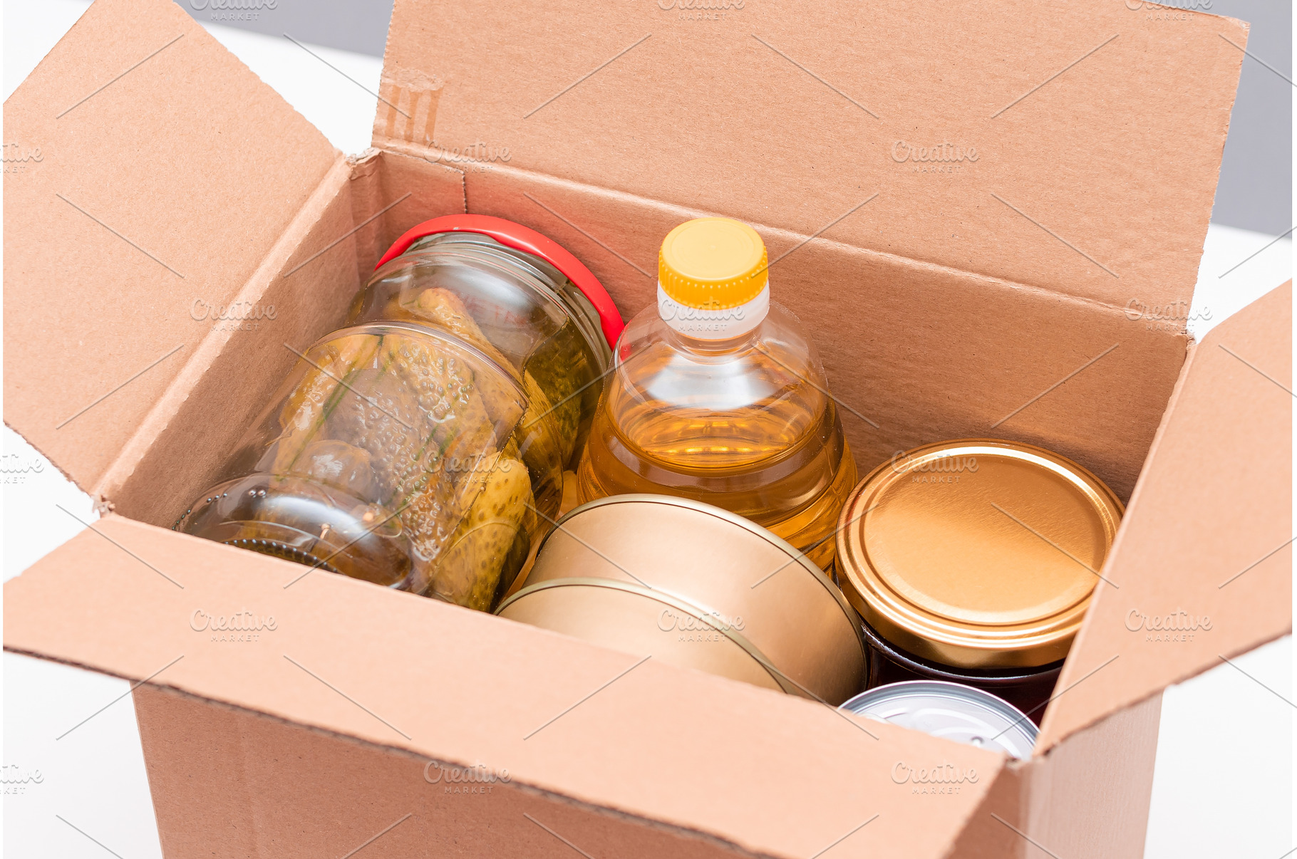 Carton Box with Canned Food, Cereals, a Food & Drink Photo by InfinitumProdux