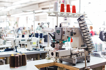 Professional sewing machine with different colors of threads containing