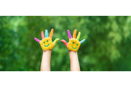 Child hands in paints a smile, an Arts & Entertainment Photo by yanadjana