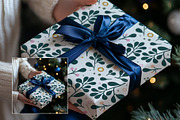 Gift Wrap Mockup w. Hands WR004-01, a Books & Magazine Mockup by Callistemon Creative (Thumbnail 7 of 8)