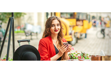 Tourist young caucasian woman in red, a Person Photo by okskukuruza