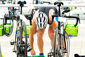 Triathlon competitors in ciclyng stock photo containing competitor and