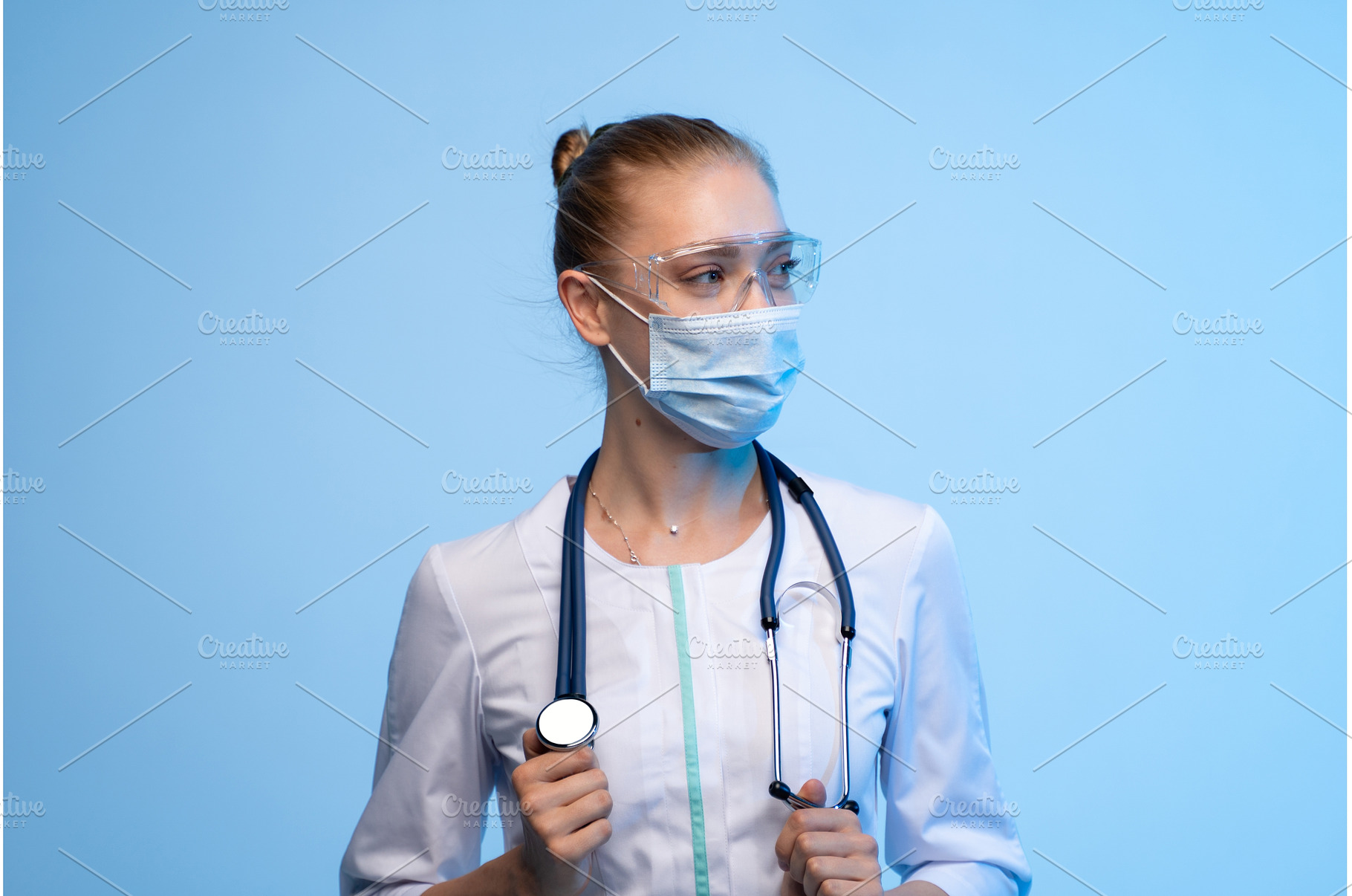 Female doctor wearing mask and, a Health & Medical Photo by volodymyrshtun13795