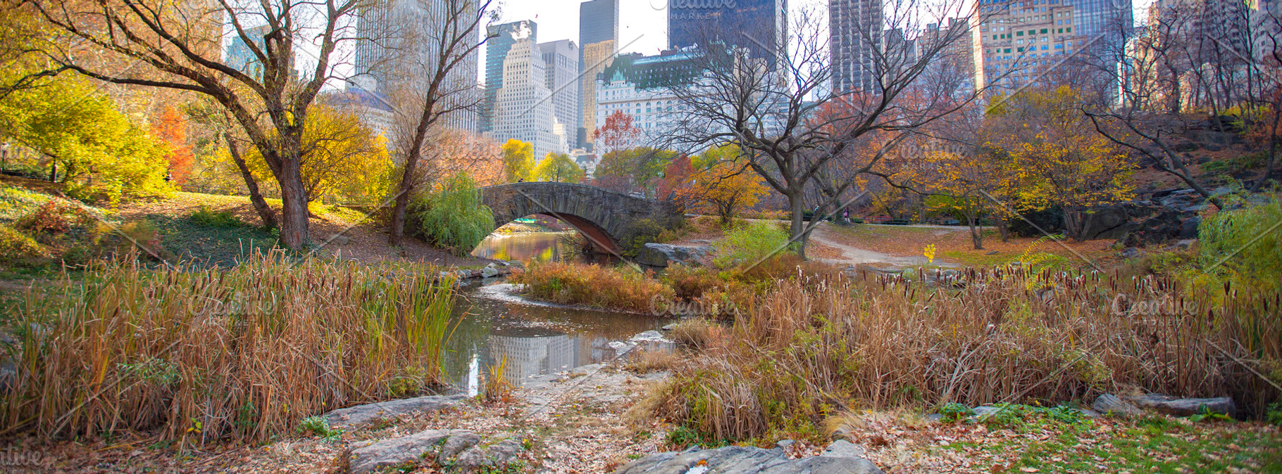 Autumn Gapstow Bridge with Manhattan skyscrapers skyline in Cent, a Photo by Pictures for you!!!!!!!!!