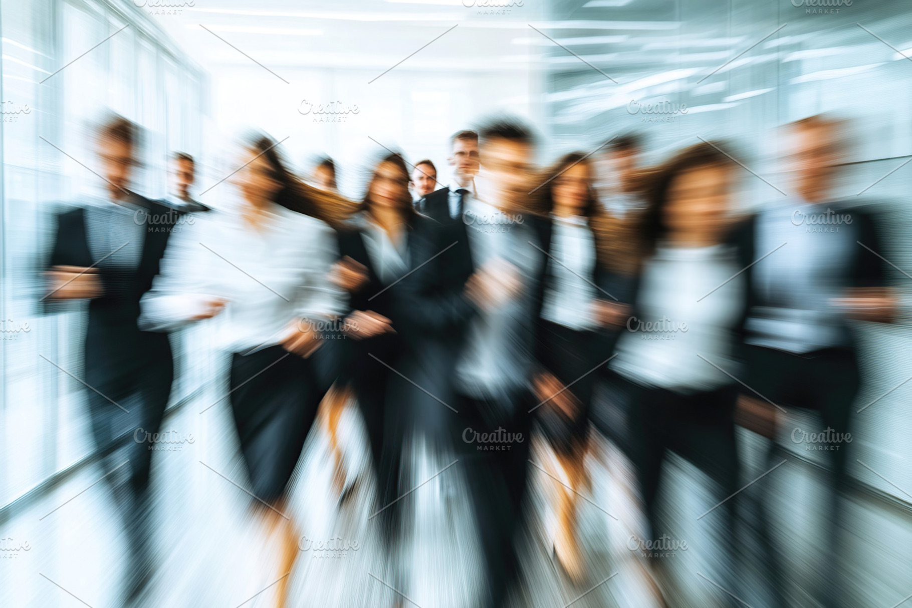 Professionals navigating a bustling modern office corridor, a Business Photo by AlyaAnd