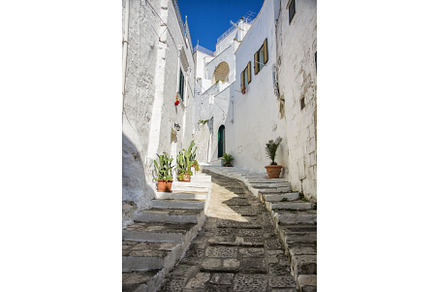 Narrow old urban street in italian