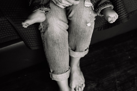legs and hands of mother and son, a Person Photo by Aksinyaeskova