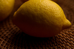 Fresh yellow lemons glowing in soft light, offering a healthy and refreshing ci, a Photo by Studio ANNA