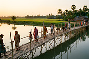 Villagers crossing a bamboo bridge, a Person Photo by nandinigraphics (Thumbnail 1 of 3)