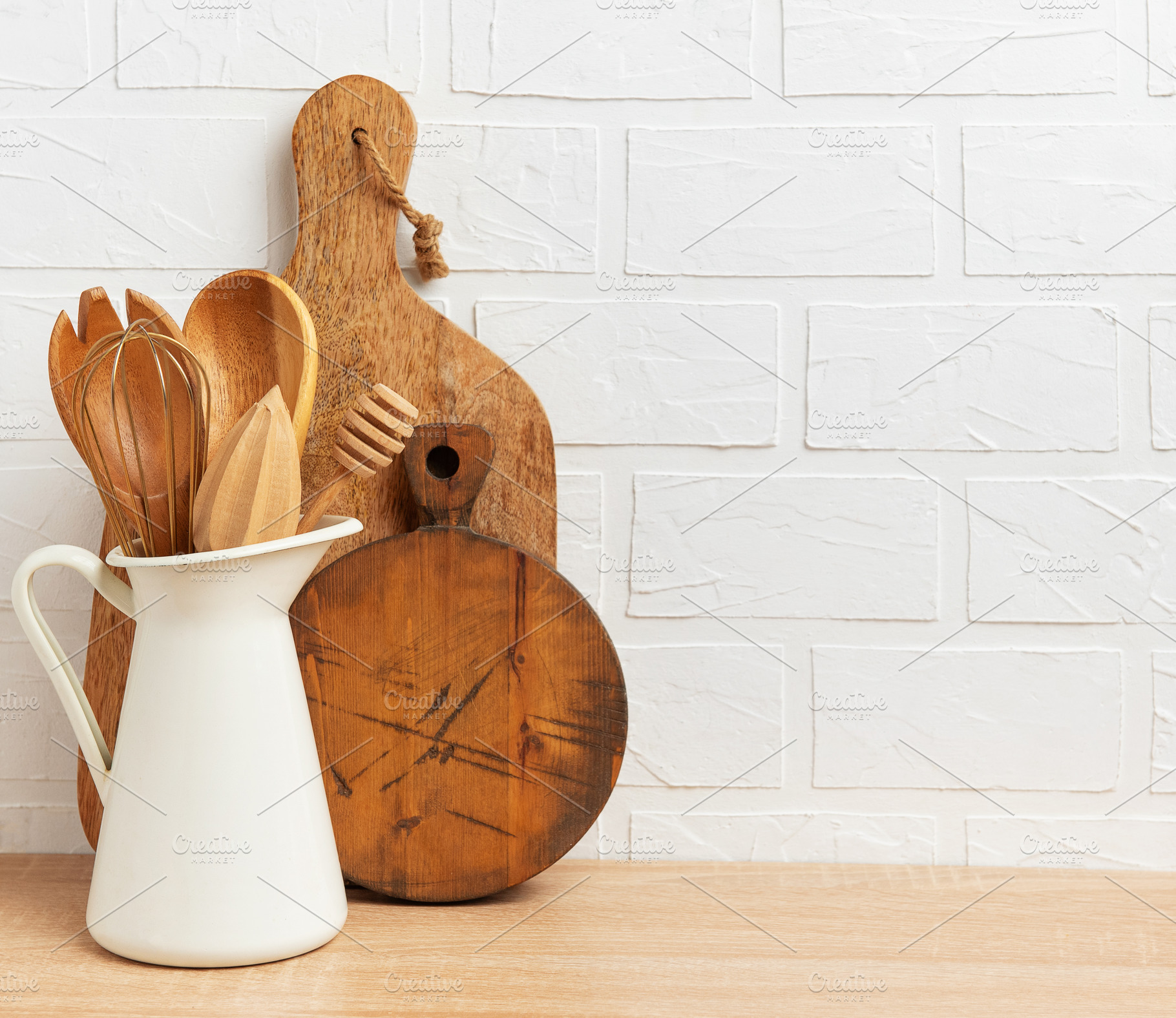 Kitchen utensils made of wood, a Food & Drink Photo by Olena Rudo