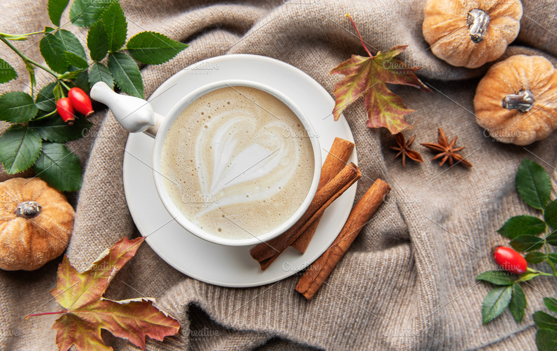 Warm autumn coffee with heart latte art and spices, a Holiday Photo by Olena Rudo