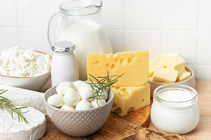 Dairy products assortment including cheese, milk, yogurt, a Food & Drink Photo by Olena Rudo