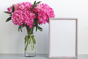 pink peonies and an empty frame