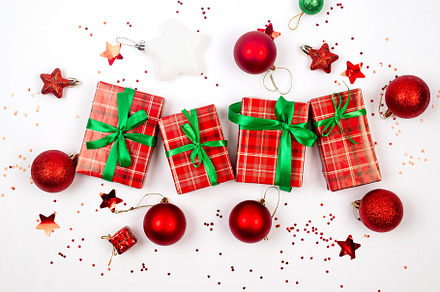 Christmas composition. Red gift boxes with green ribbon at white, a Holiday Photo by vimart