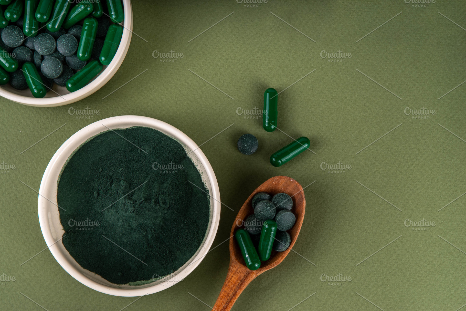 Spirulina in powder, capsules and tablets with spirulina smoothi, a Health & Medical Photo by Rimma