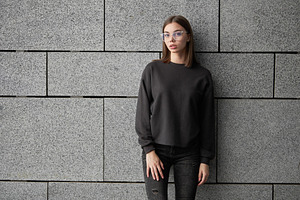 Woman wearing black sweatshirt