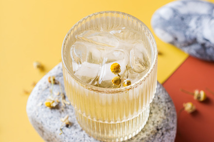 Hard seltzer cocktail with chamomile and ice, a Food & Drink Photo by Antonina Vlasova
