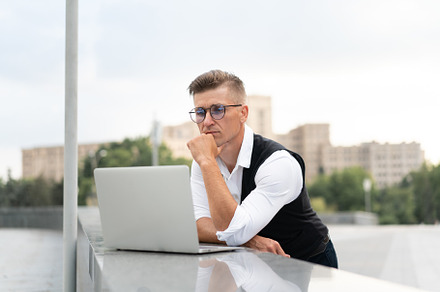 Business. Businessman Using Laptop Outdoors. Modern Technology Concept, a Person Photo by andreonegin market