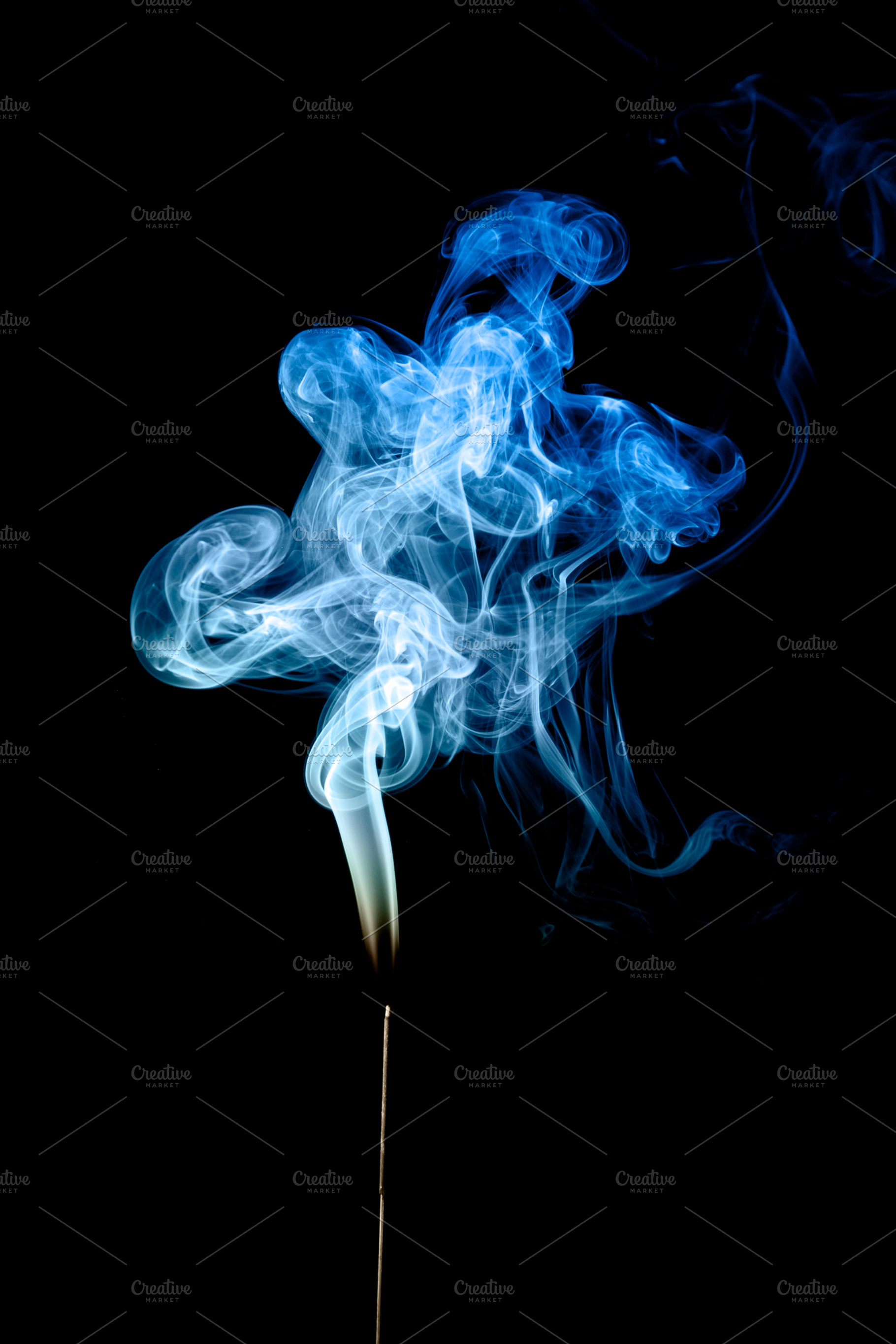 Real incense smoke colored in blue, an Abstract Photo by Irantzu Arbaizagoitia