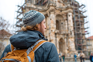 Exploring a historic monument under renovation with a travel enthusiast, a Person Photo by AlyaAnd