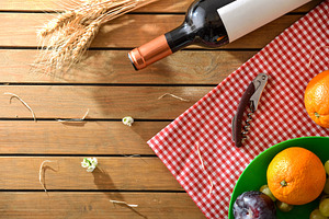 Rustic Picnic Table with Wine and Fruit, a Holiday Photo by Davizro's Market