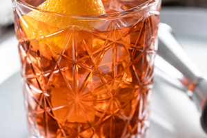 Americano cocktail garnished with twist orange, a Food & Drink Photo by etorres69