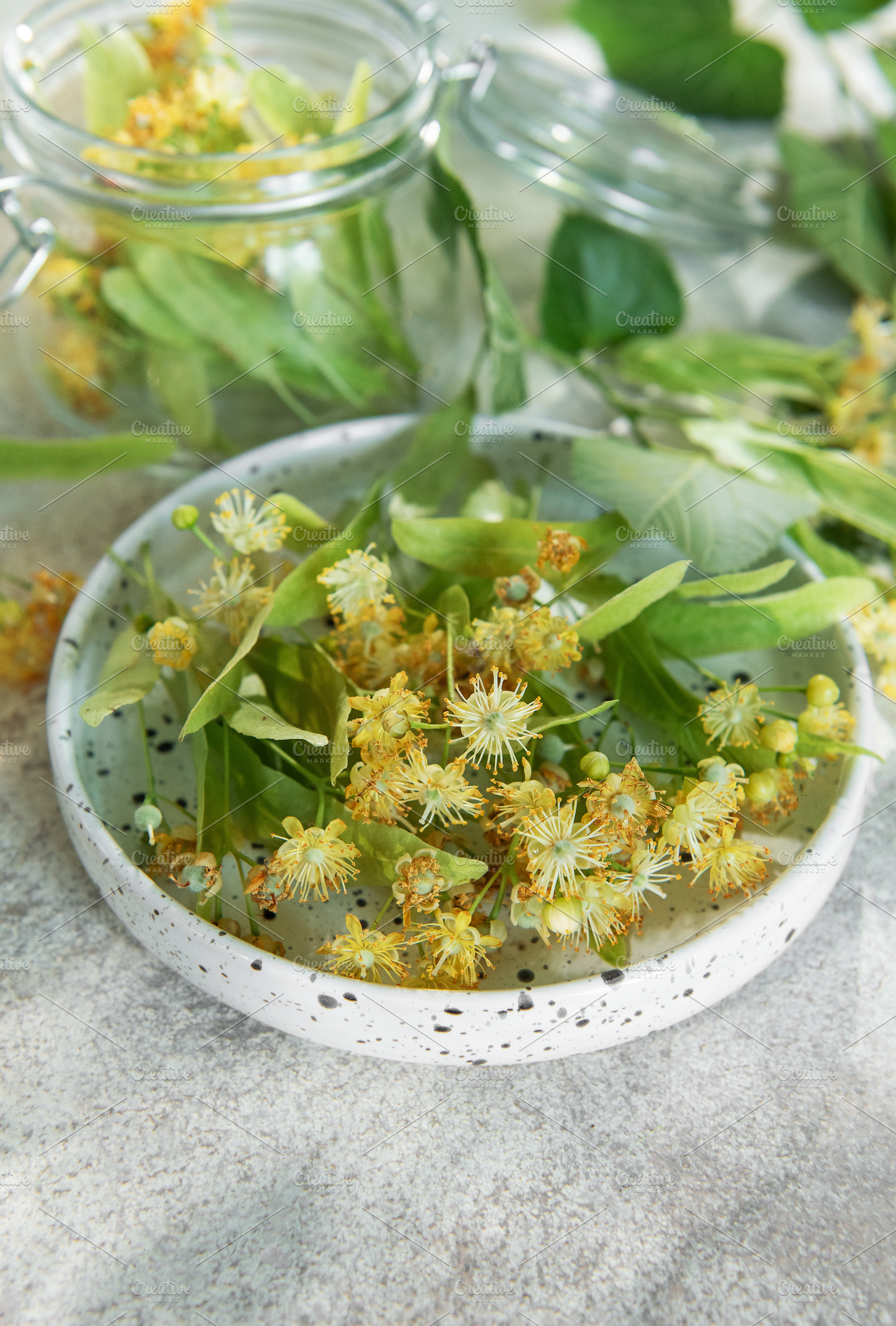 Linden flowers preparing for herbal tea infusion, a Food & Drink Photo by Olena Rudo