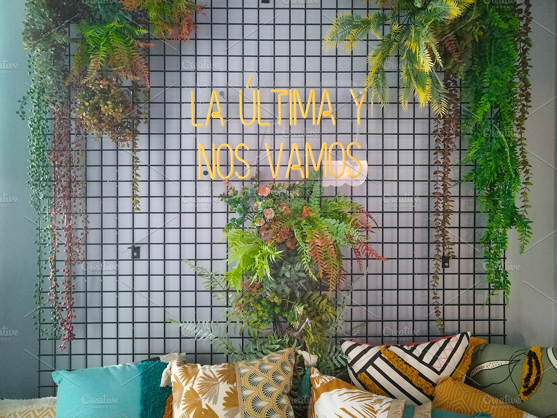 Neon phrase and plants over urban garden, a Photo by DanFLCreativo