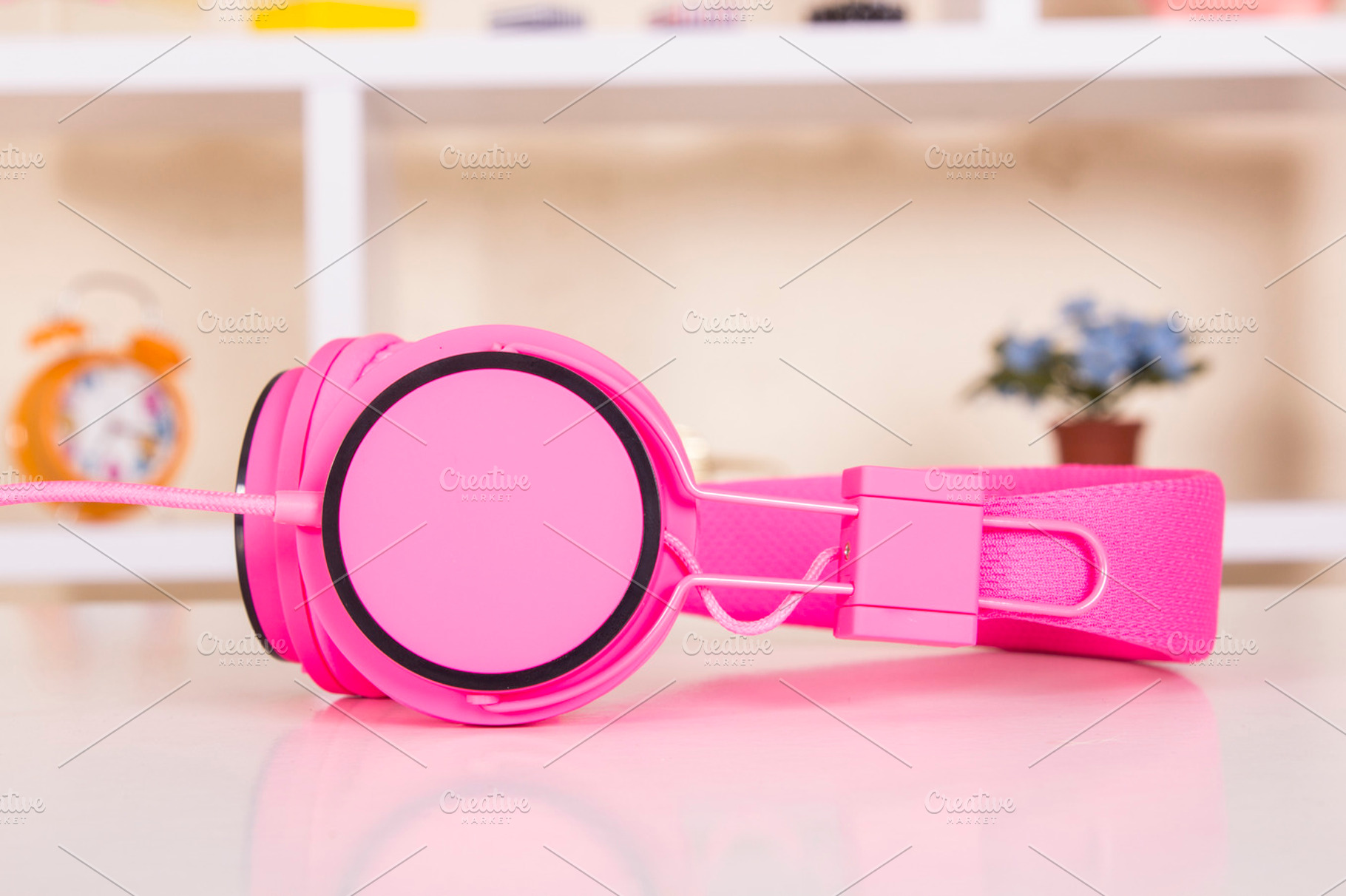 Headphones on table stock photo containing plastic and eye, an Abstract Photo by Carlos Die Banyuls