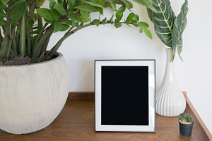 white frame,frame in room