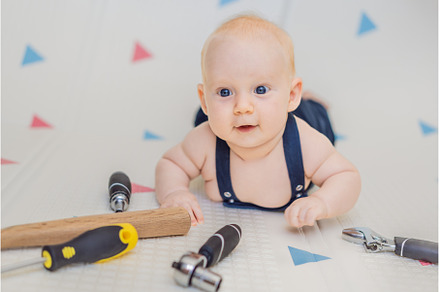 Adorable baby in a mechanic costume