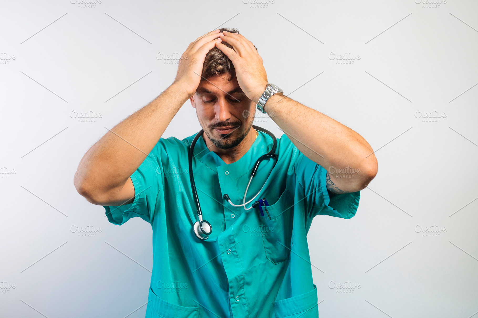 Frustrated Doctor Touching Head with Hand, a Person Photo by karrastock