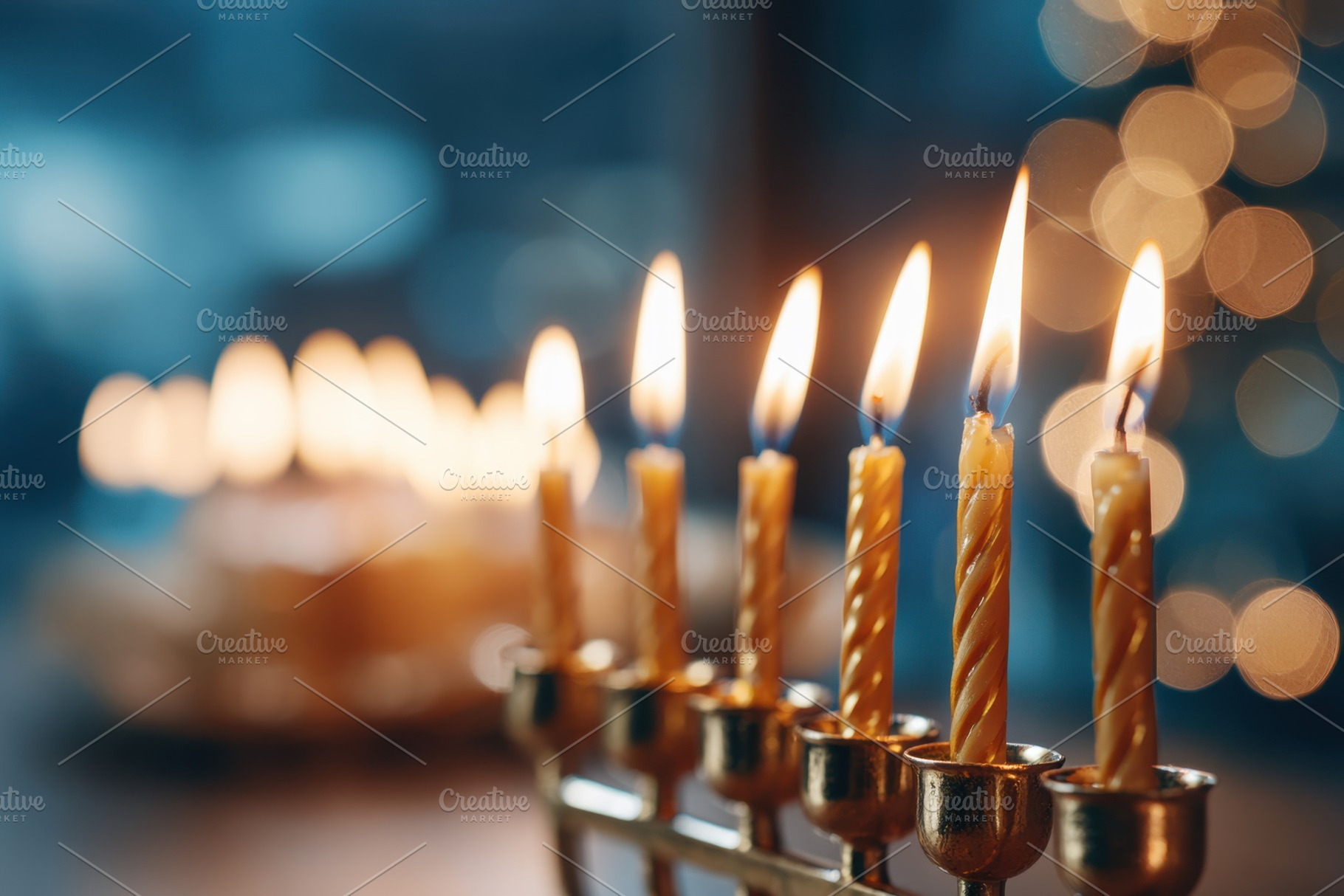 Lit menorah candles for Hanukkah celebration, a Holiday Photo by AlyaAnd
